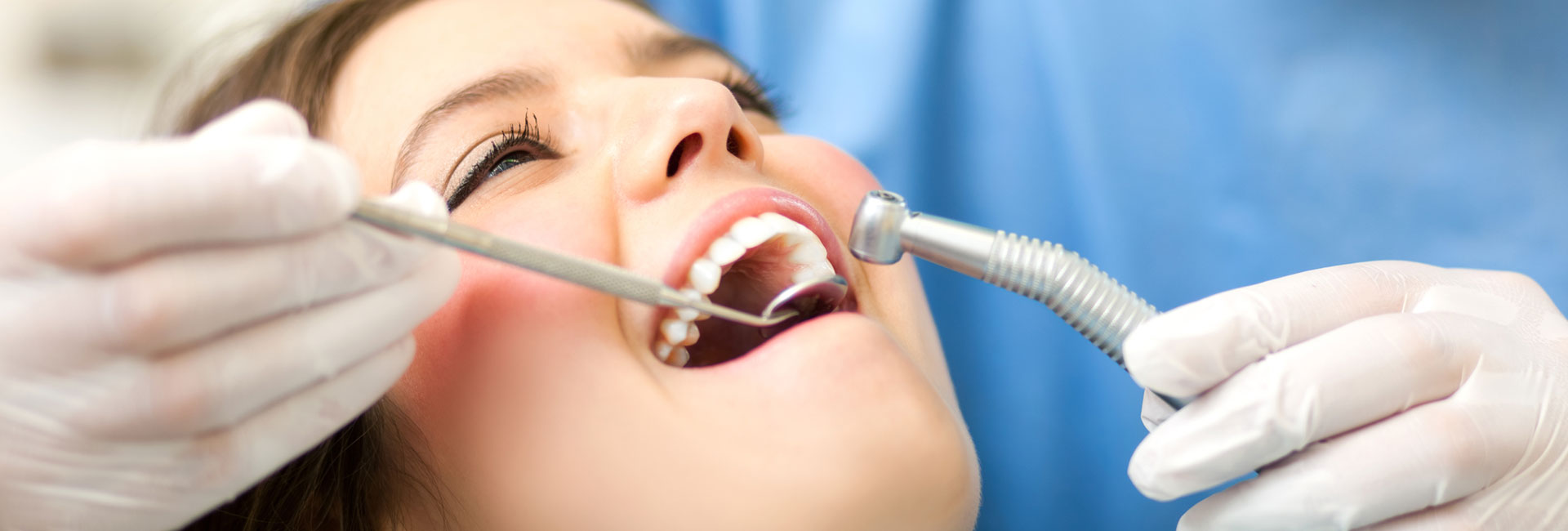Female patient having dental treatment with Diagnodent